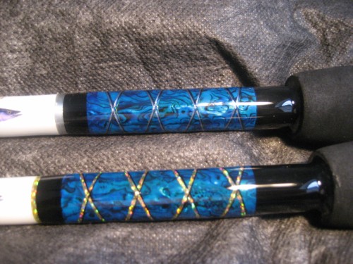 two Abalone shell trolling rods