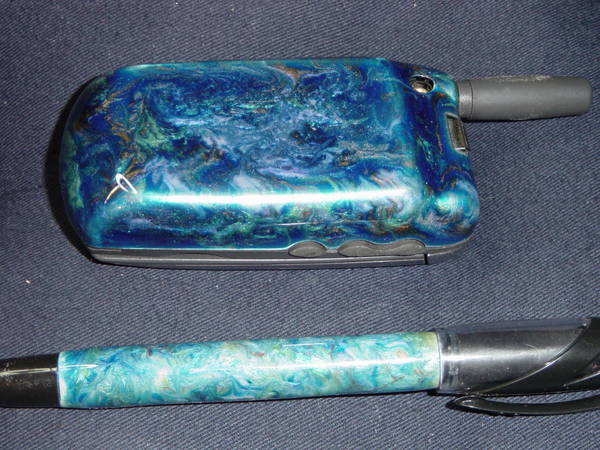 Marbled pen and cell phone