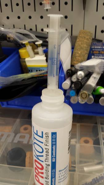 Syringe holder fitting