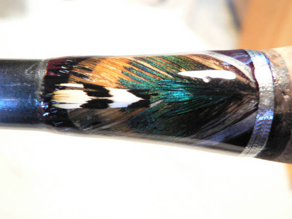 First feather inlay