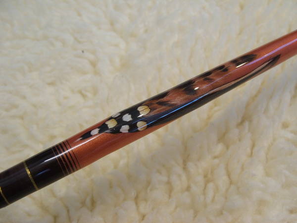 Feather inlay